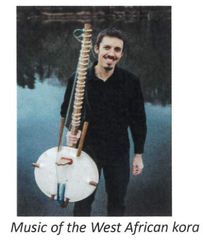 man holding Africcan kora instrument 